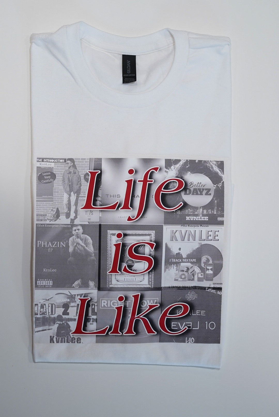 "Life Is Like" 4. Black and White Covers - Red Text - White T-Shirt L / XL